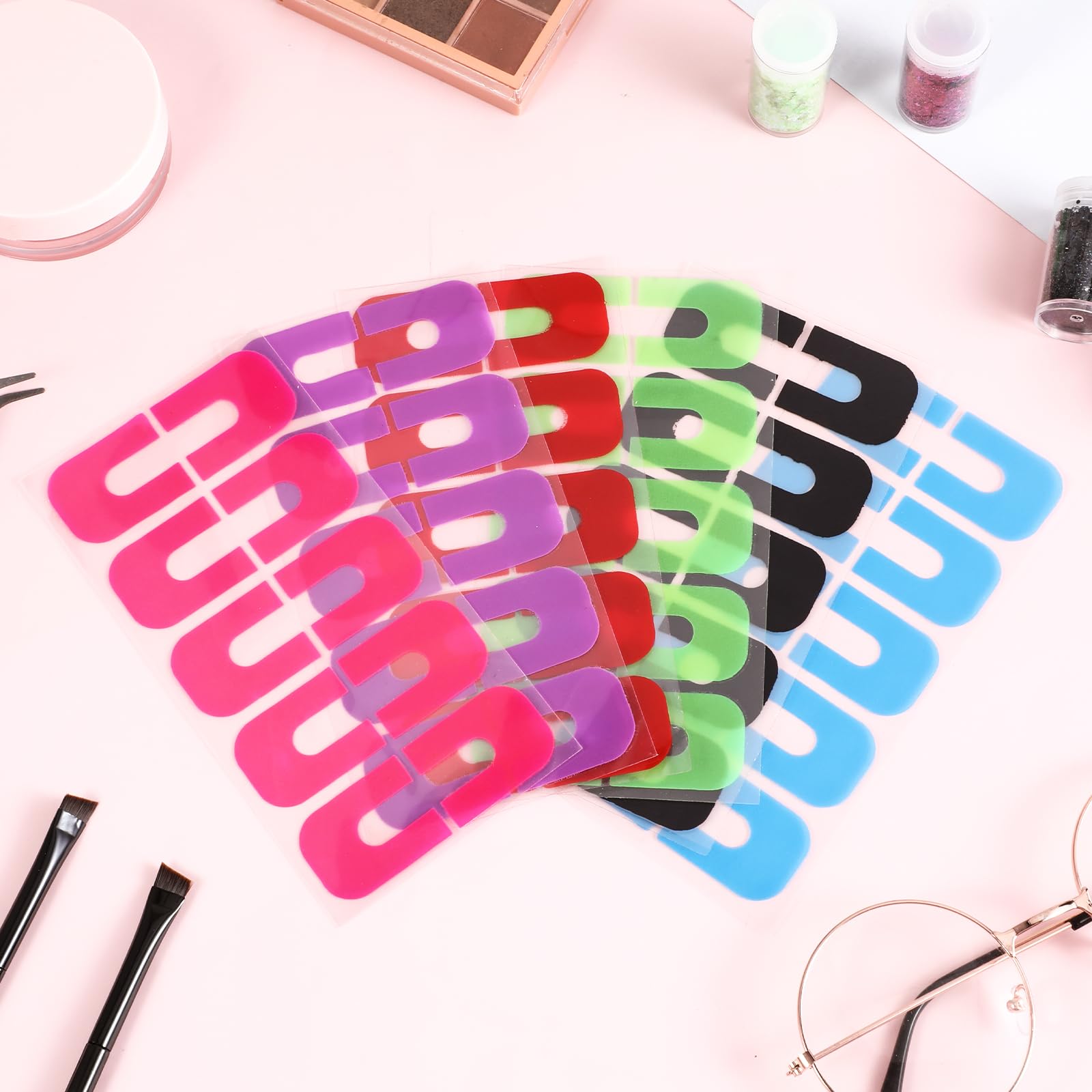 One hundred and twenty piece assortment of colorful finger protectors for manicures