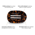 Teleties flat profile hair clip resting on a flat surface