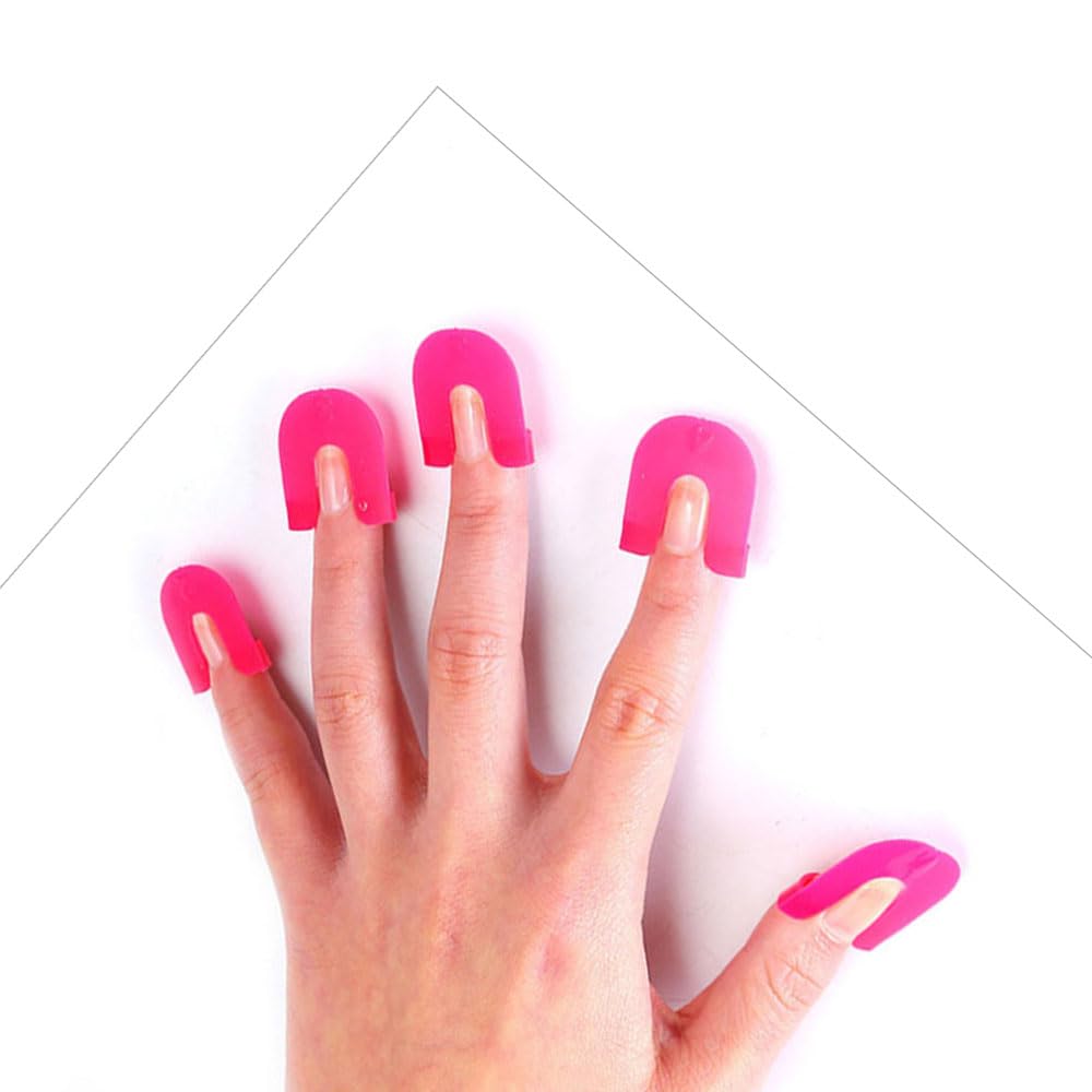 Hot pink plastic U shaped nail stencils preventing edge overflow during varnish application