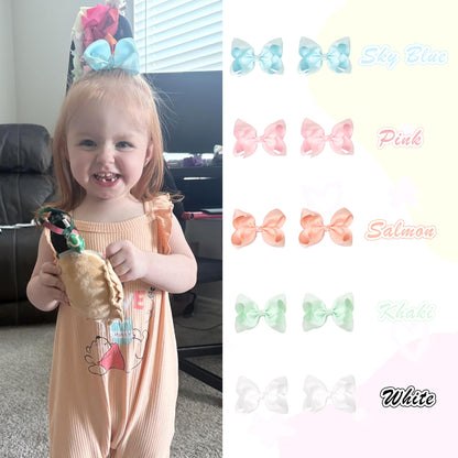 CÃ©llot hair bows displayed in 20 matching pairs for versatile styling