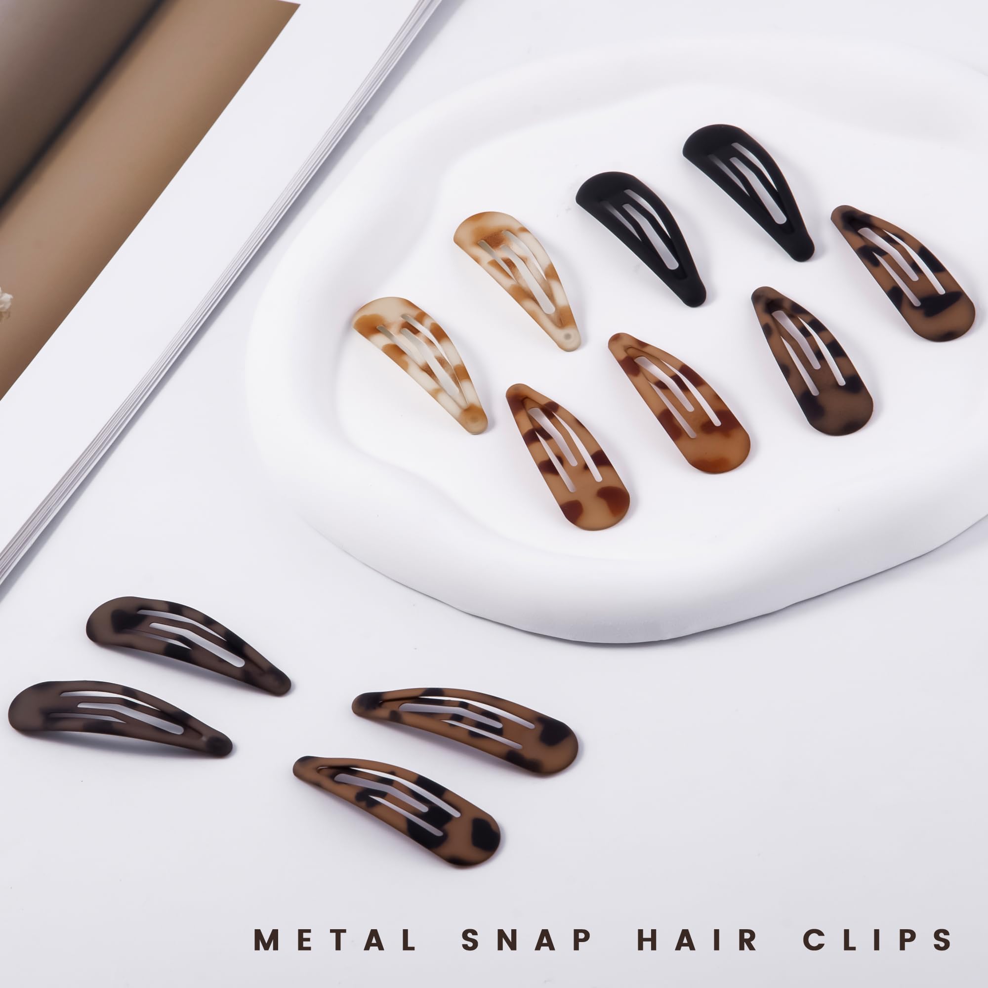 Close up of matte black hair snap clips for thin hair