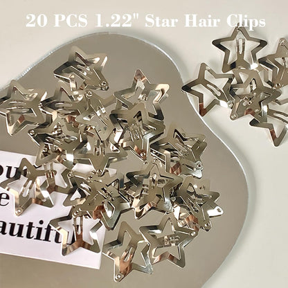 Close up view of the 1.22 inch silver metal snap mechanism on the star hair clip.