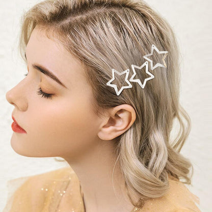 Authentic imported star shaped silver hair clips pack presentation.