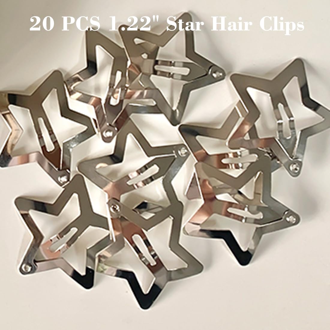 Seneeel star metal barrettes styled creatively in long braided hair for a festival look.