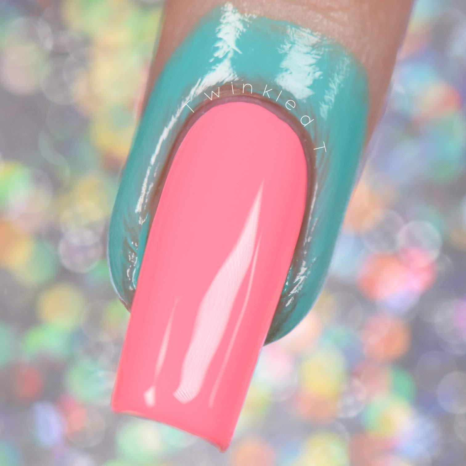 Mint blue colored liquid cuticle barrier by Twinkled T being brushed around the nail edges