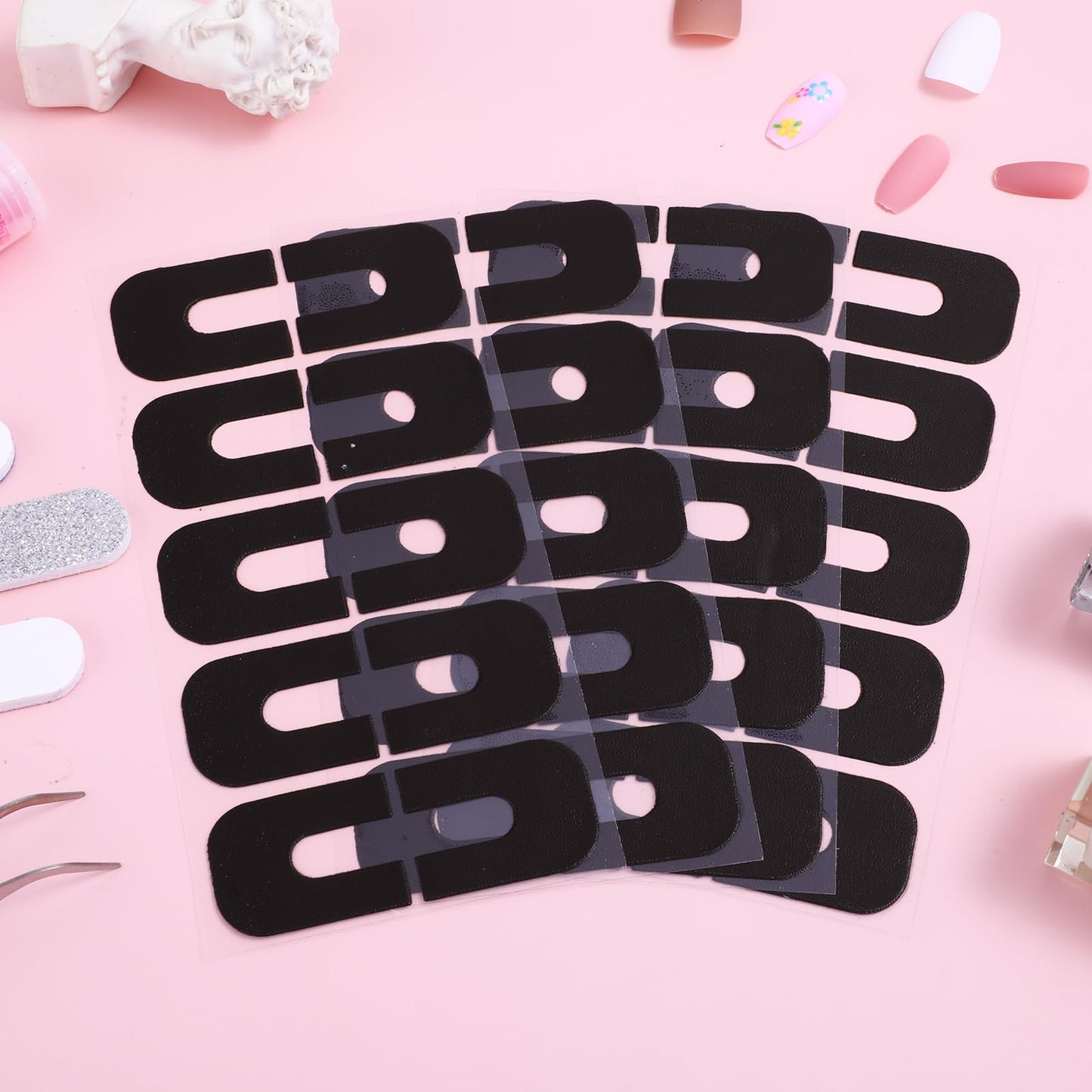 A multi-angle view of the one hundred and fifty piece nail paint guard kit for home styling.
