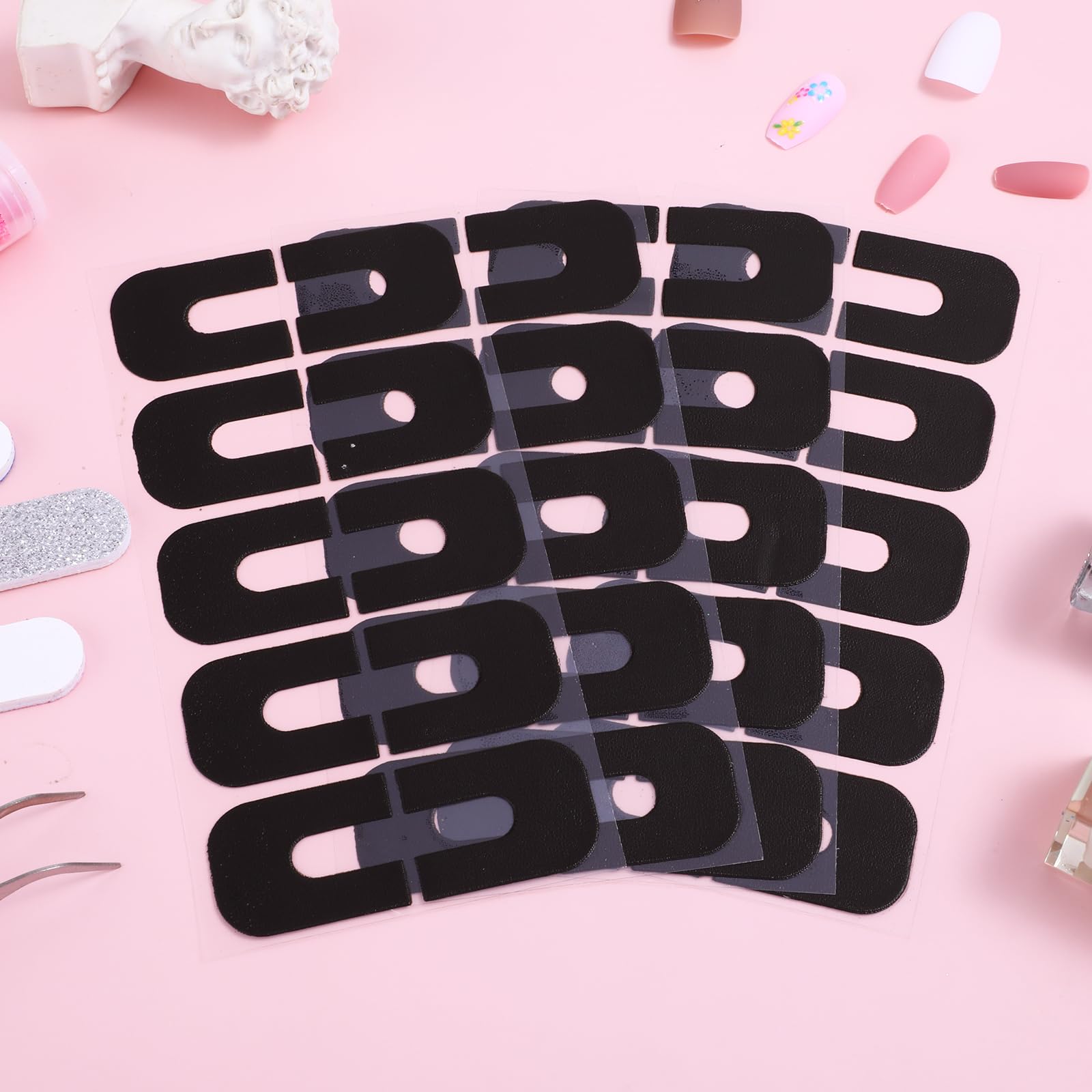 A multi-angle view of the one hundred and fifty piece nail paint guard kit for home styling.