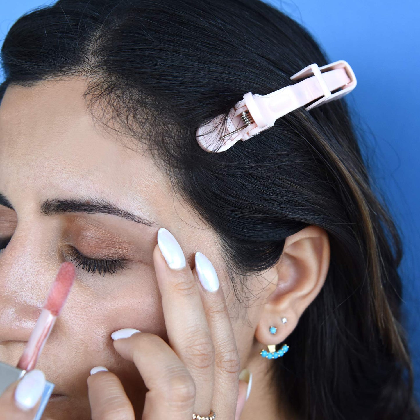 Handheld sectioning hair clips displayed in a set of ten professional pieces