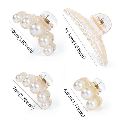 Four piece set of pearl hair barrette clamps in different sizes and designs