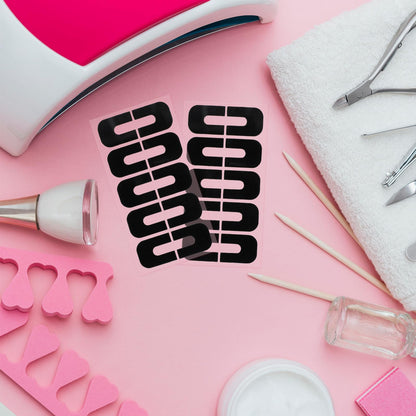 Manicure process step using stamping plates and protective finger barriers