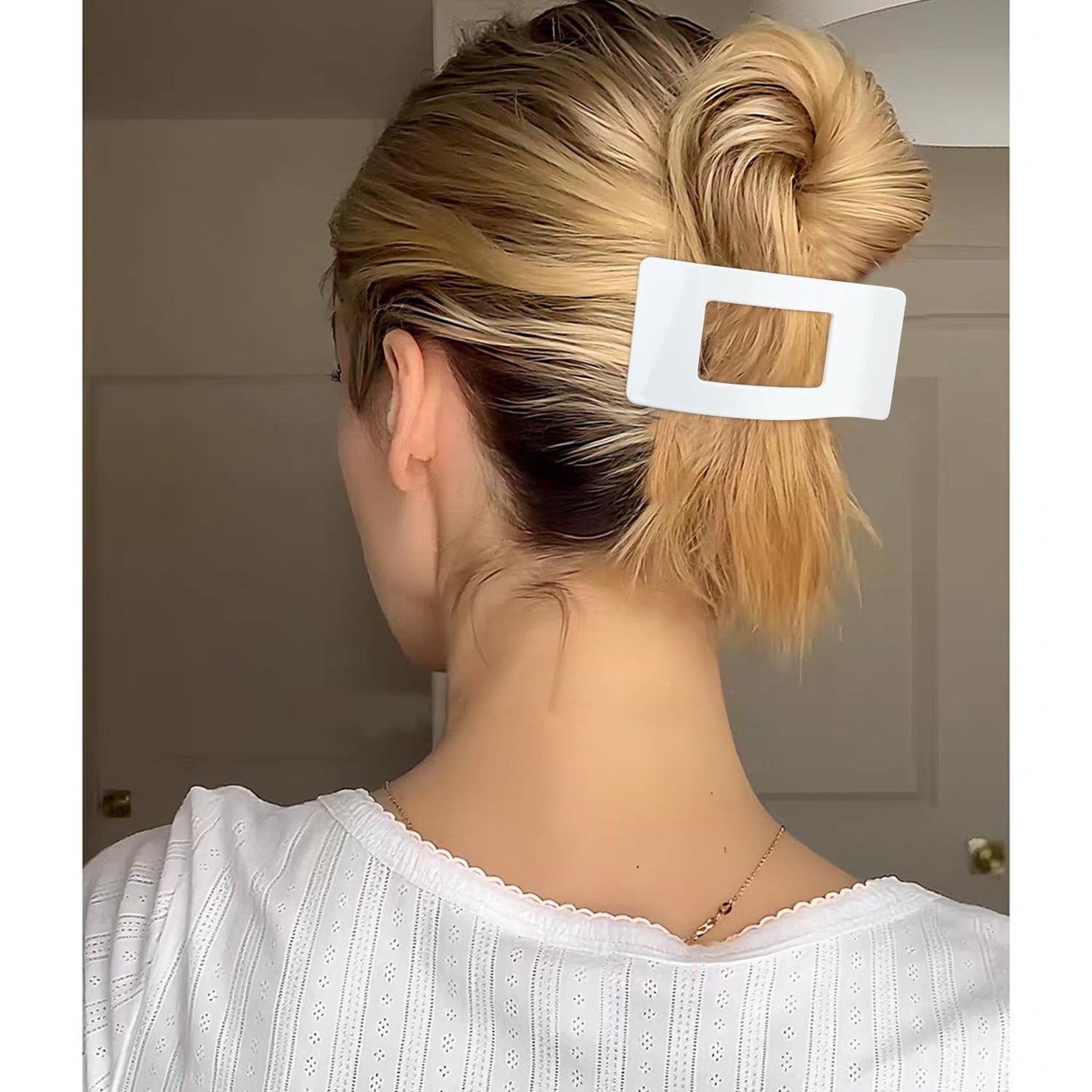 Velscrun hair clips held in hand for size reference