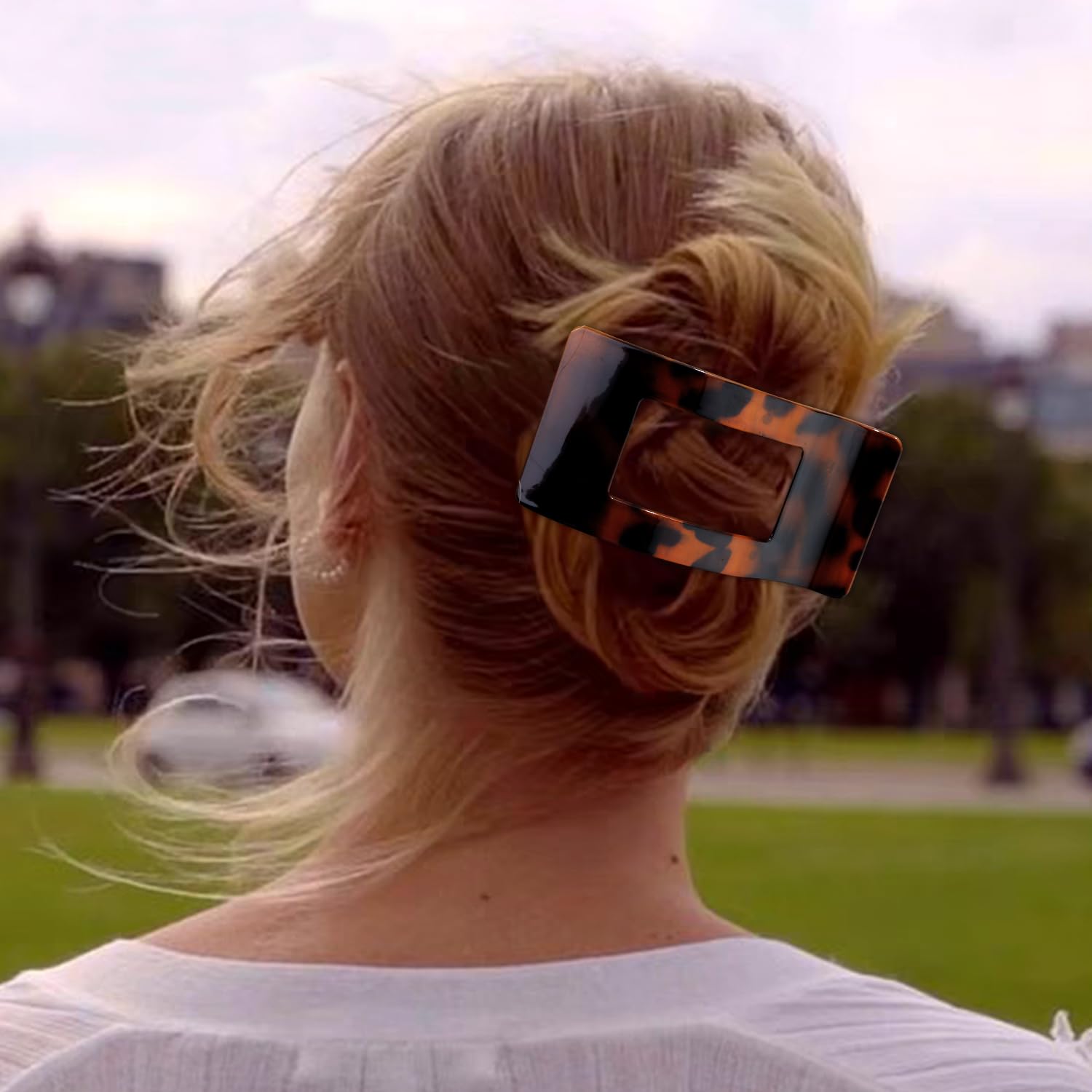 Model wearing Velscrun flat hair clip in half up style