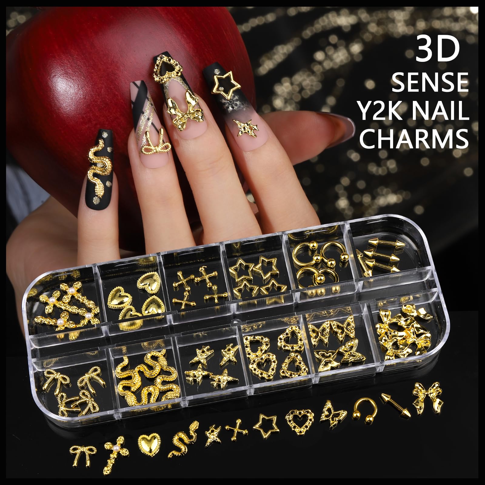 Close up of 3D gold cross charms and metallic nail gems