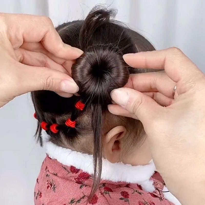 Detailed view of small nylon hair bun form