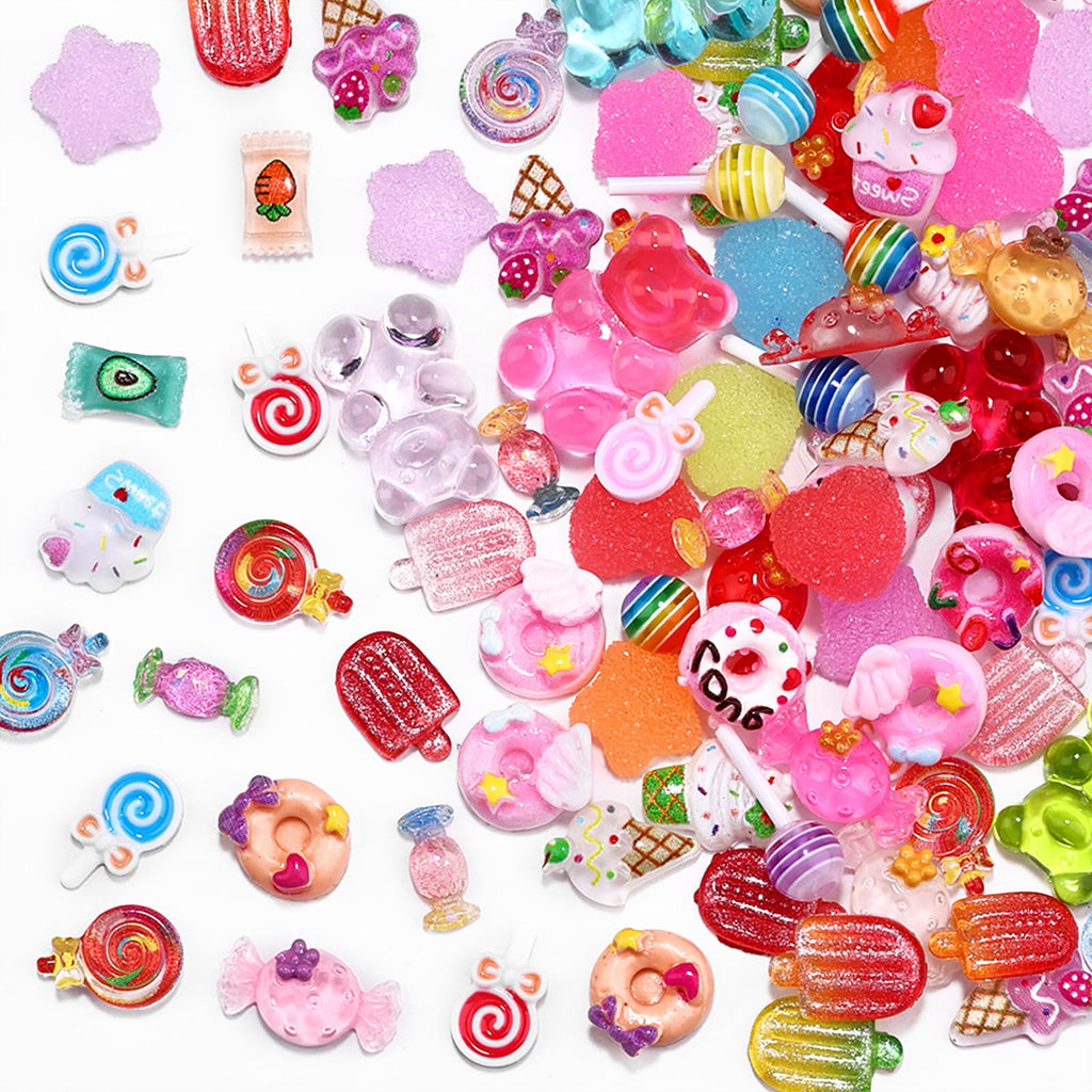 Creative nail art design layout featuring multiple sweet charms