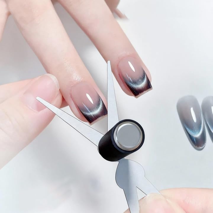 Close up of 2-in-1 scissor shaped nail magnet for French tips
