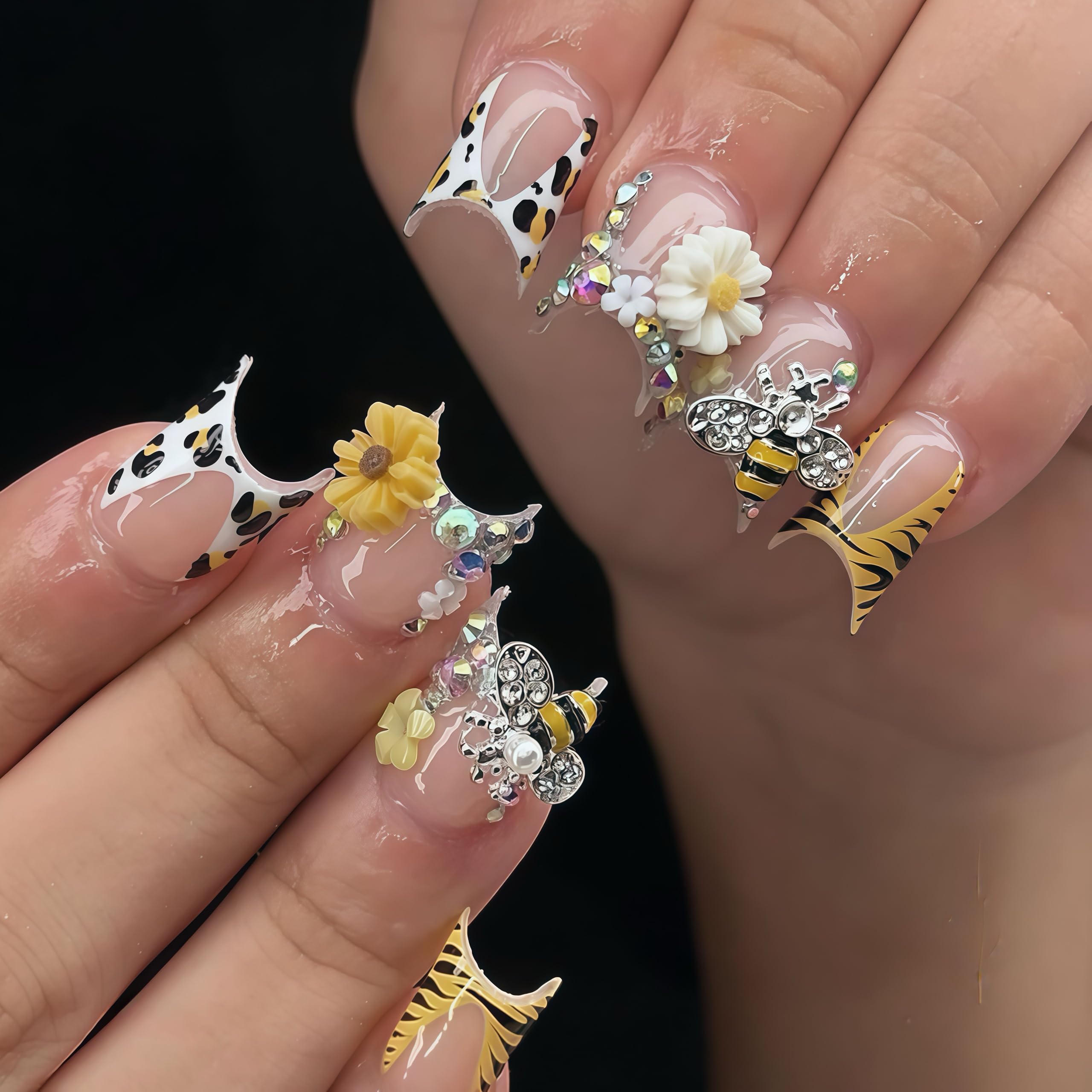 Top view of bulk nail art decor set gold bee and daisy