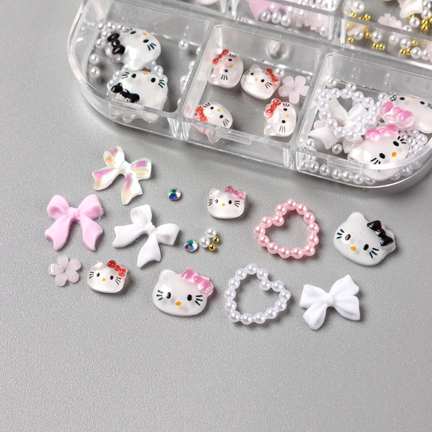 Top view of organized 6-grid nail charm storage container
