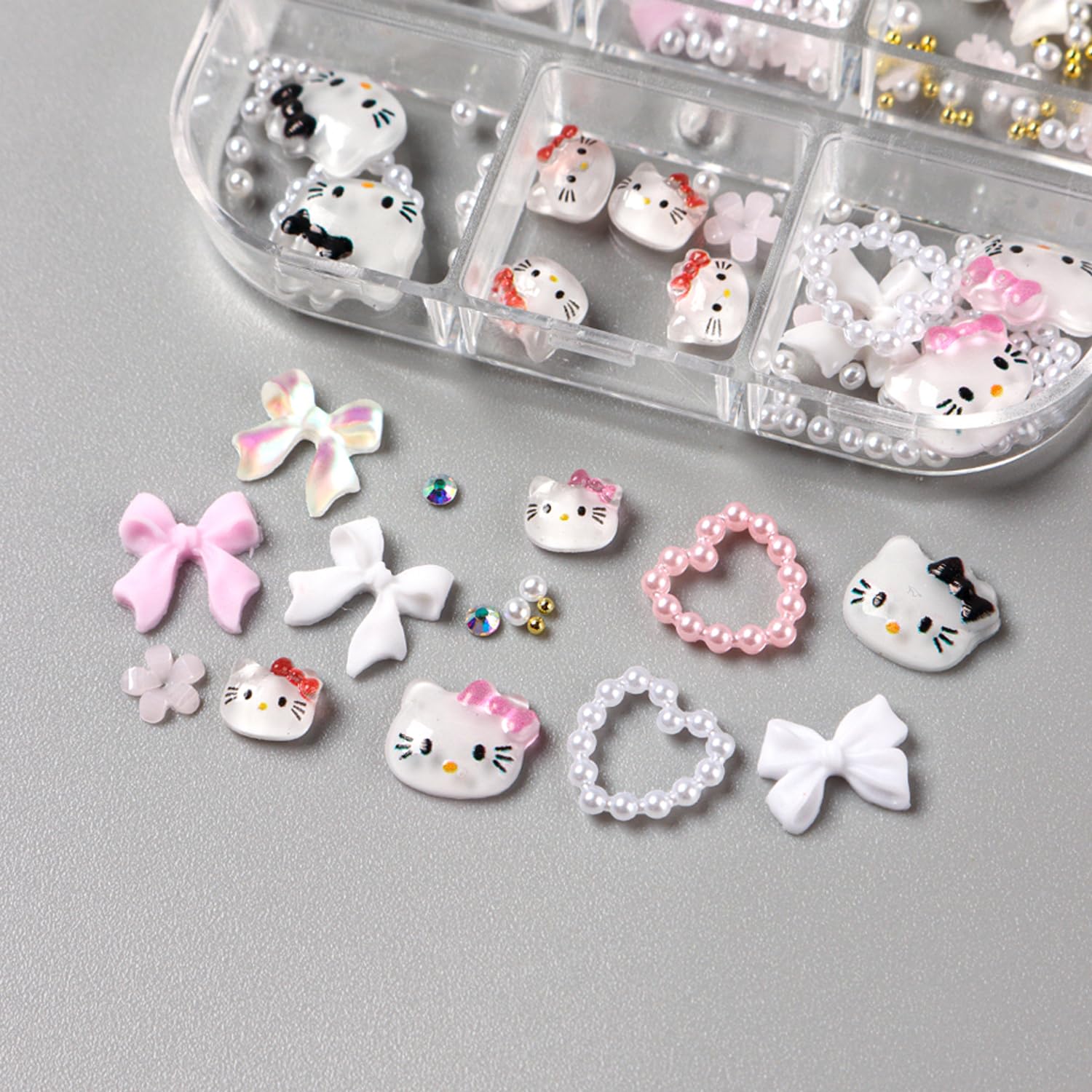Top view of organized 6-grid nail charm storage container