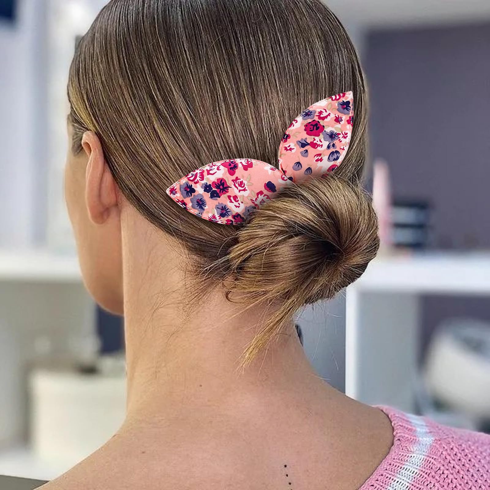 Step by step demonstration of a French twist hairstyle being created using the lazy hair band.