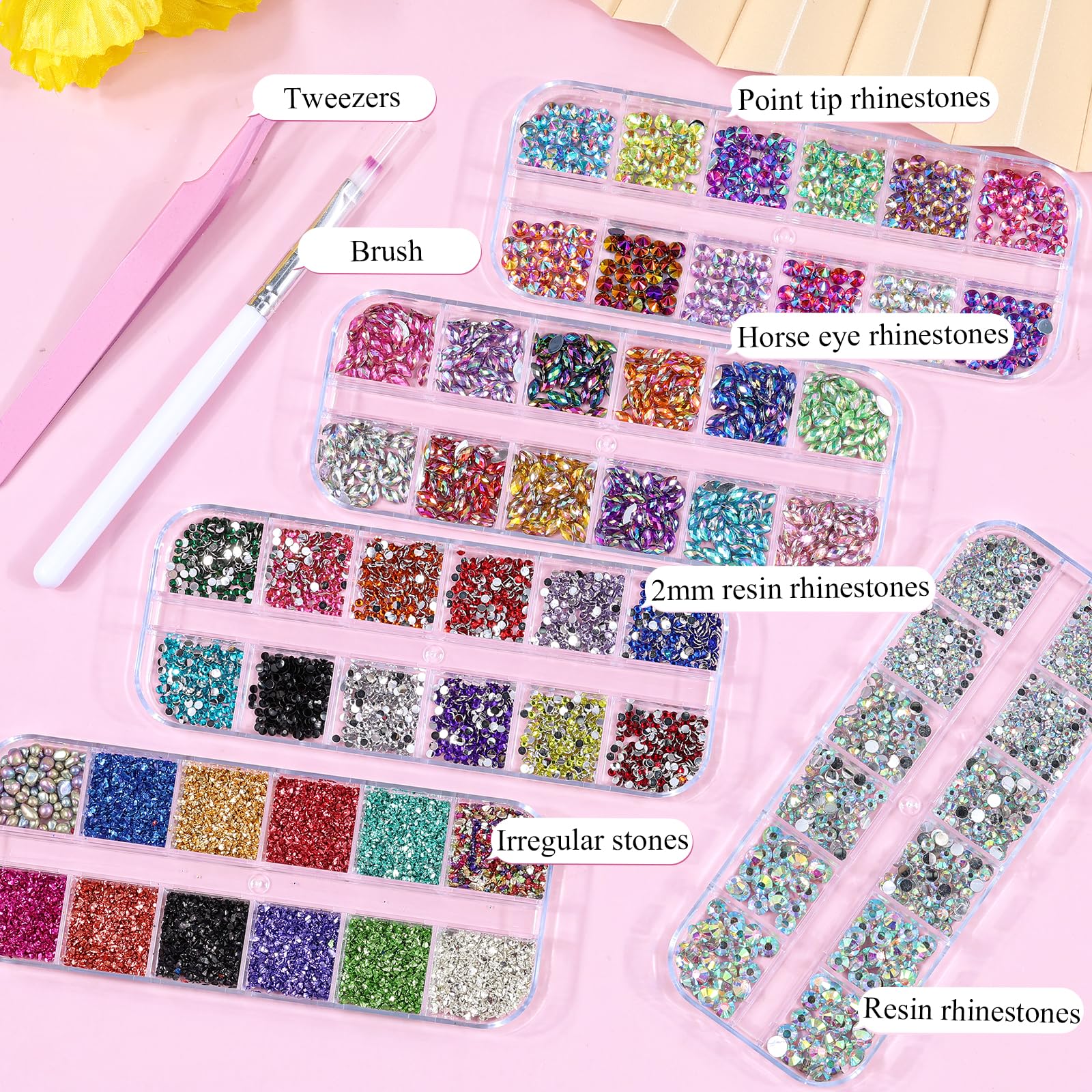 Premium flatback horse eye resin rhinestones shining in twelve distinct rainbow colors for detailed nail designs.