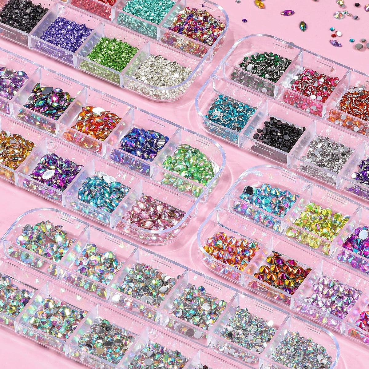 Multicolor nail rhinestones arranged for manicure design