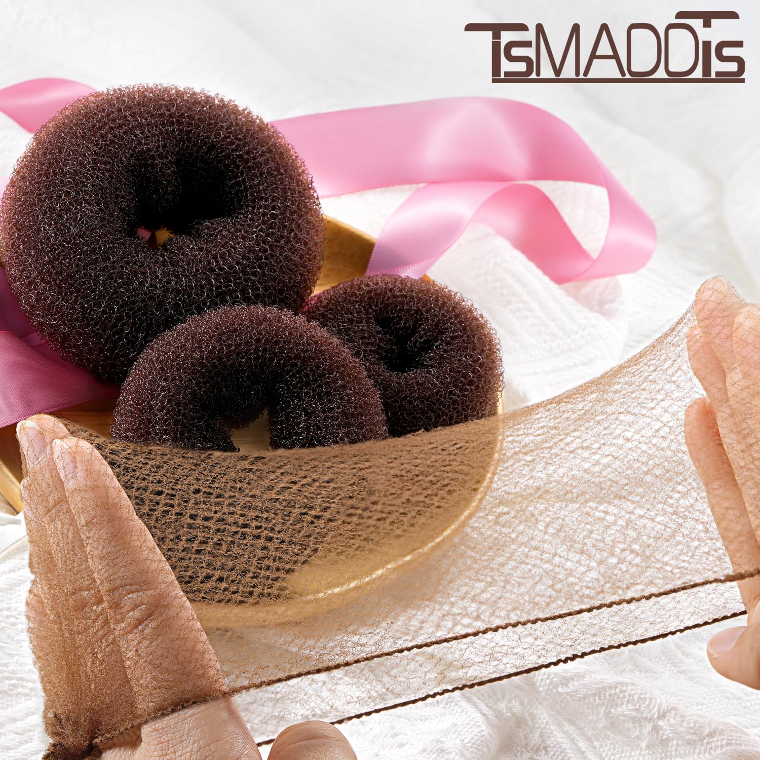 Full packaging presentation of the imported TsMADDTs hair styling kit for professional updos.