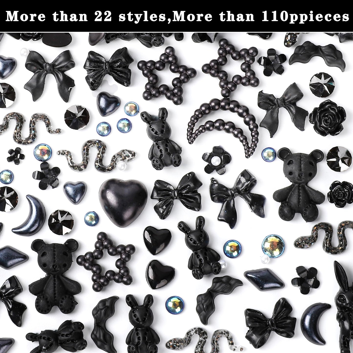 Detailed view of black resin flatback camellia rose and bowknot accessories for acrylic manicure decoration