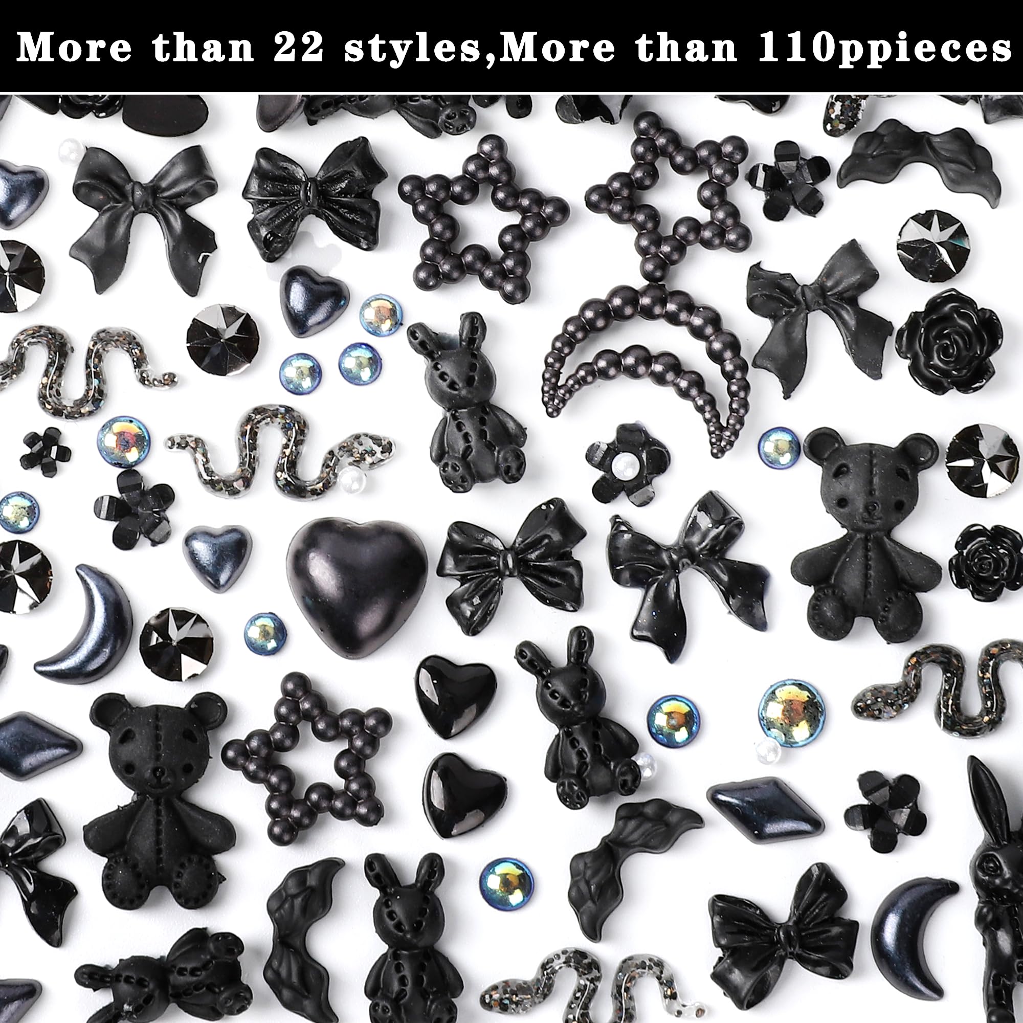 Detailed view of black resin flatback camellia rose and bowknot accessories for acrylic manicure decoration