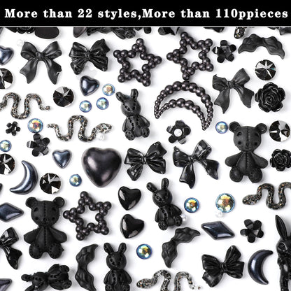 Detailed view of black resin flatback camellia rose and bowknot accessories for acrylic manicure decoration
