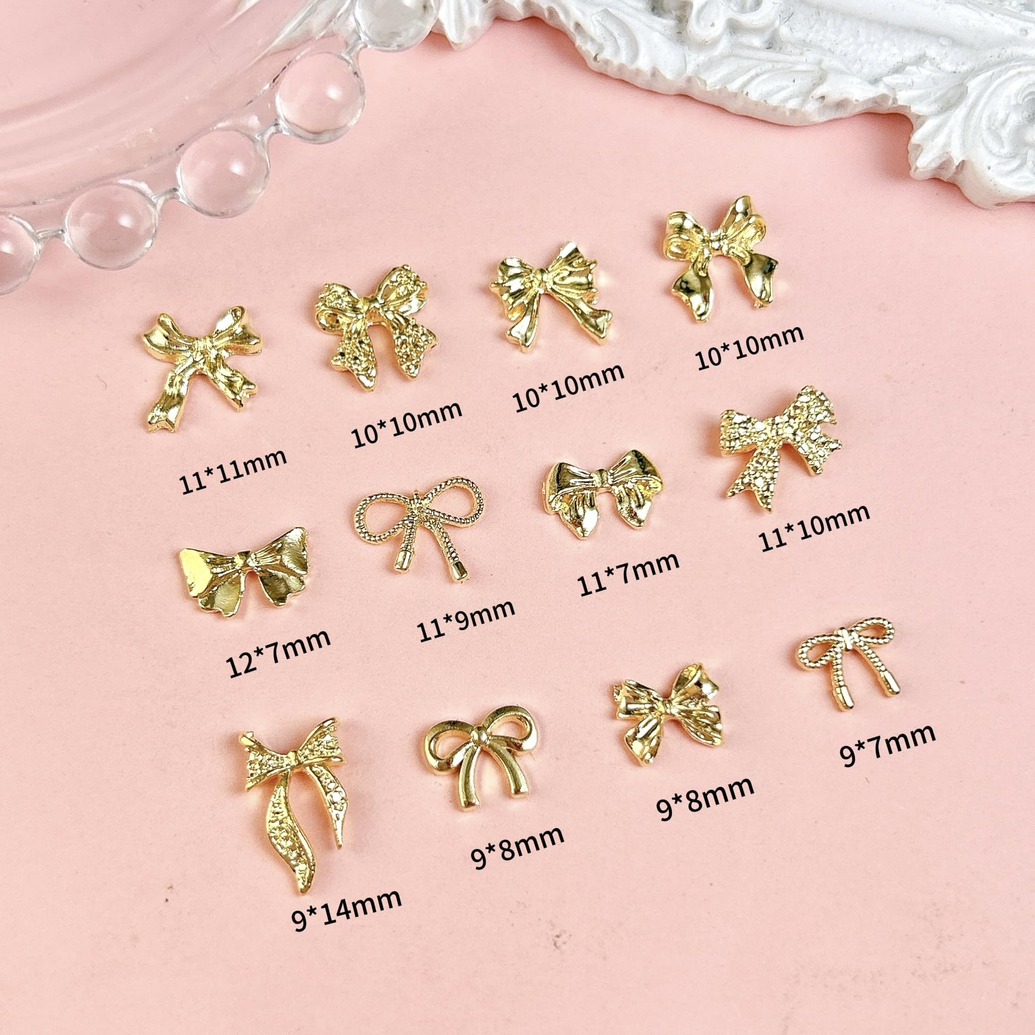 Close up of 3D metal alloy bowknot nail art decorations