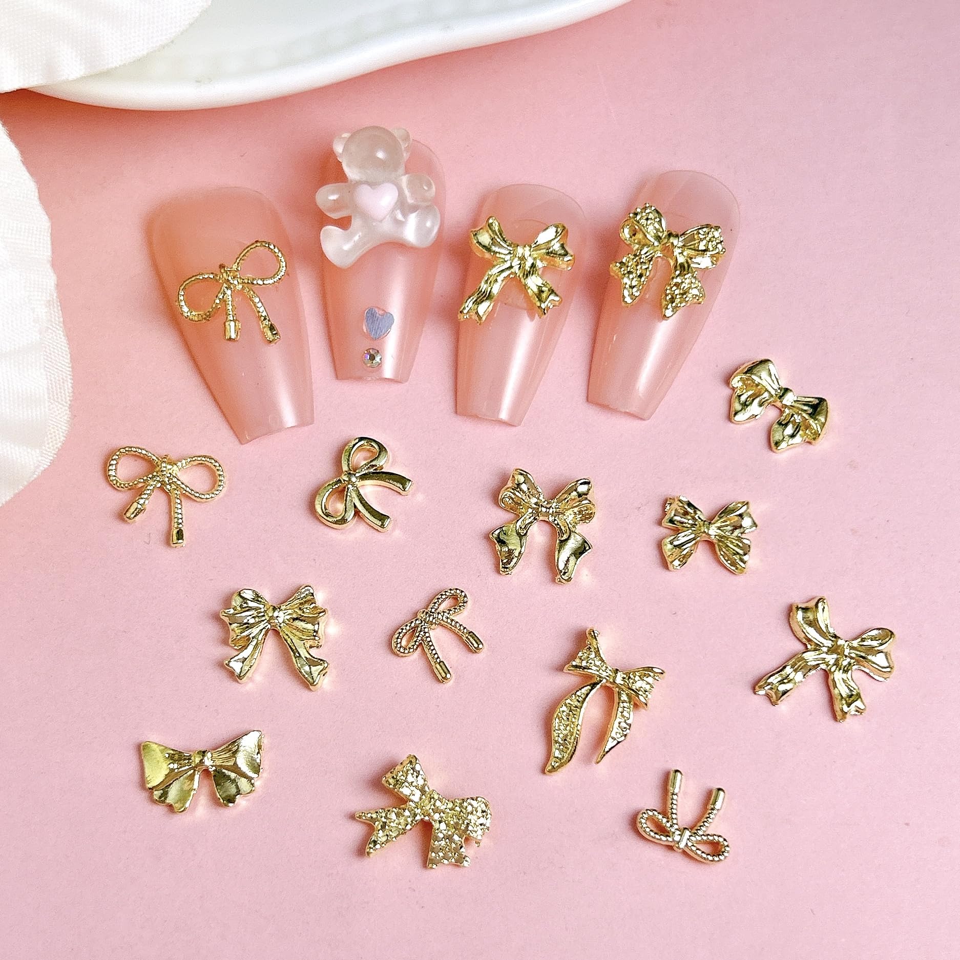 Assorted gold bow charms for acrylic nail extensions