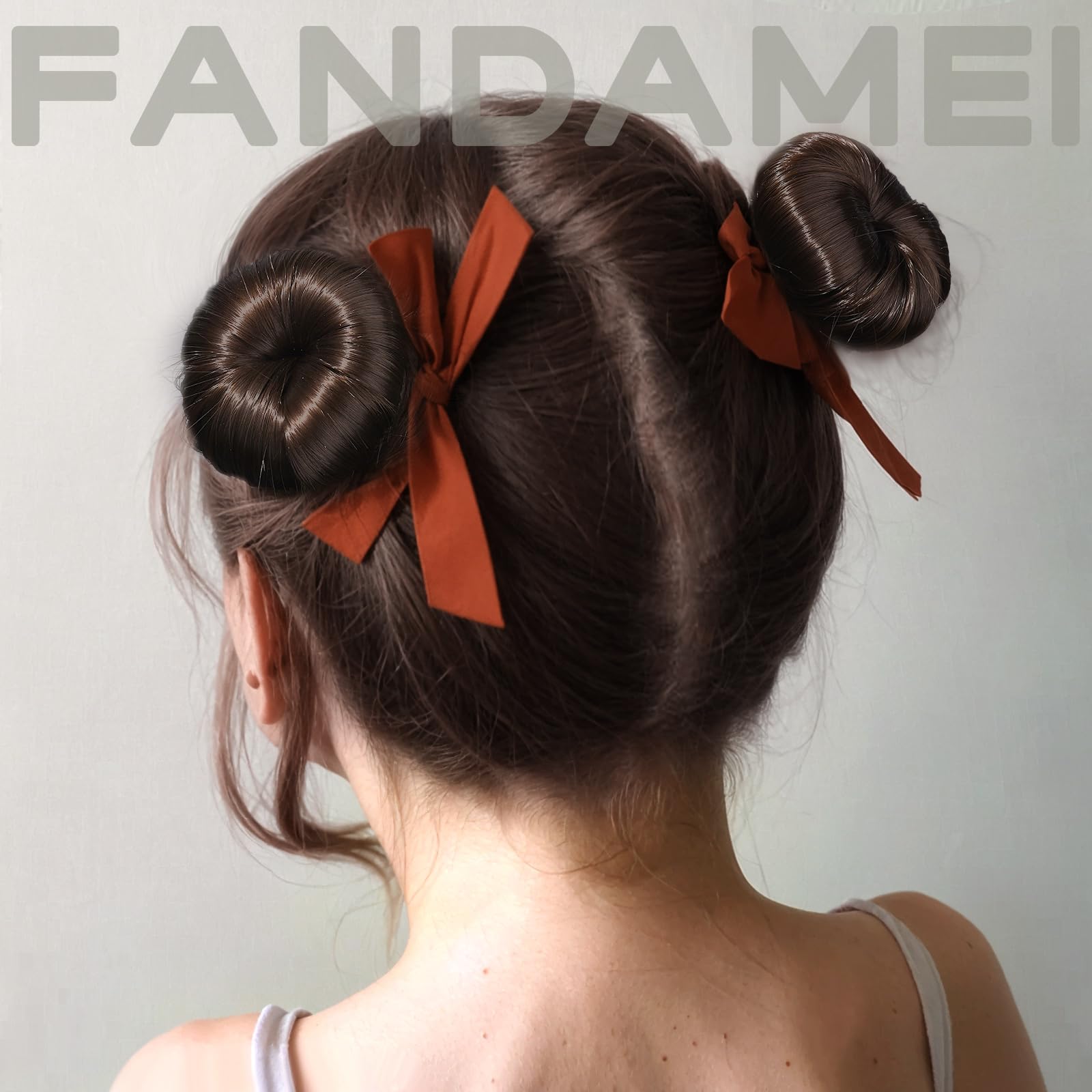 Fandamei hair bun kit for dancers containing forty pieces of brown metal hair pins