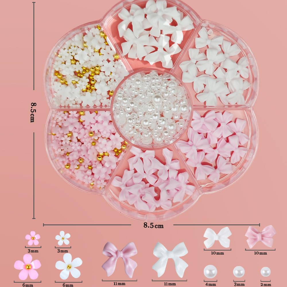 Packaging overview of the Qdsuh seven slot box bow and flower nail art decoration collection.
