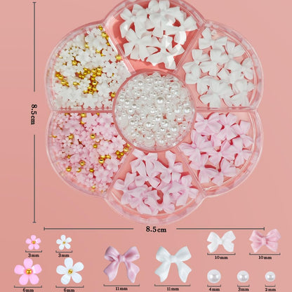Packaging overview of the Qdsuh seven slot box bow and flower nail art decoration collection.