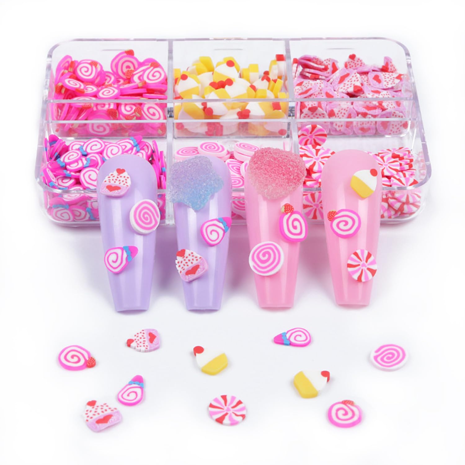 Detailed view of candy and cake 3D nail charms in container