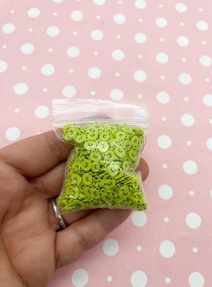 Handcrafted slime decorated with chartreuse frog fimo slices