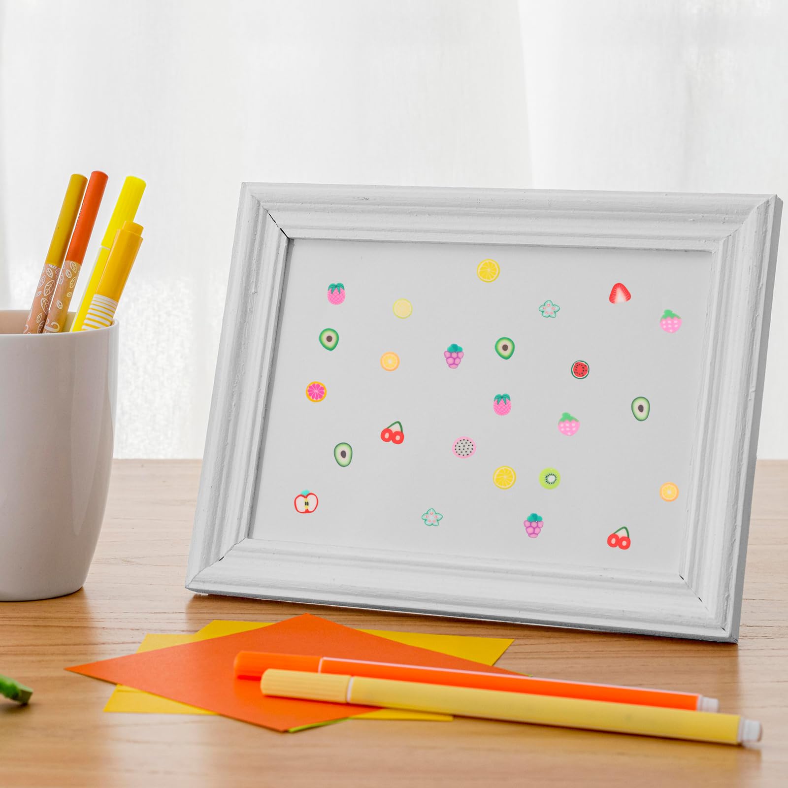 Variety of fruit designs including strawberry and kiwi slices