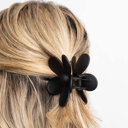 Side profile of large flower hair clip for thick hair