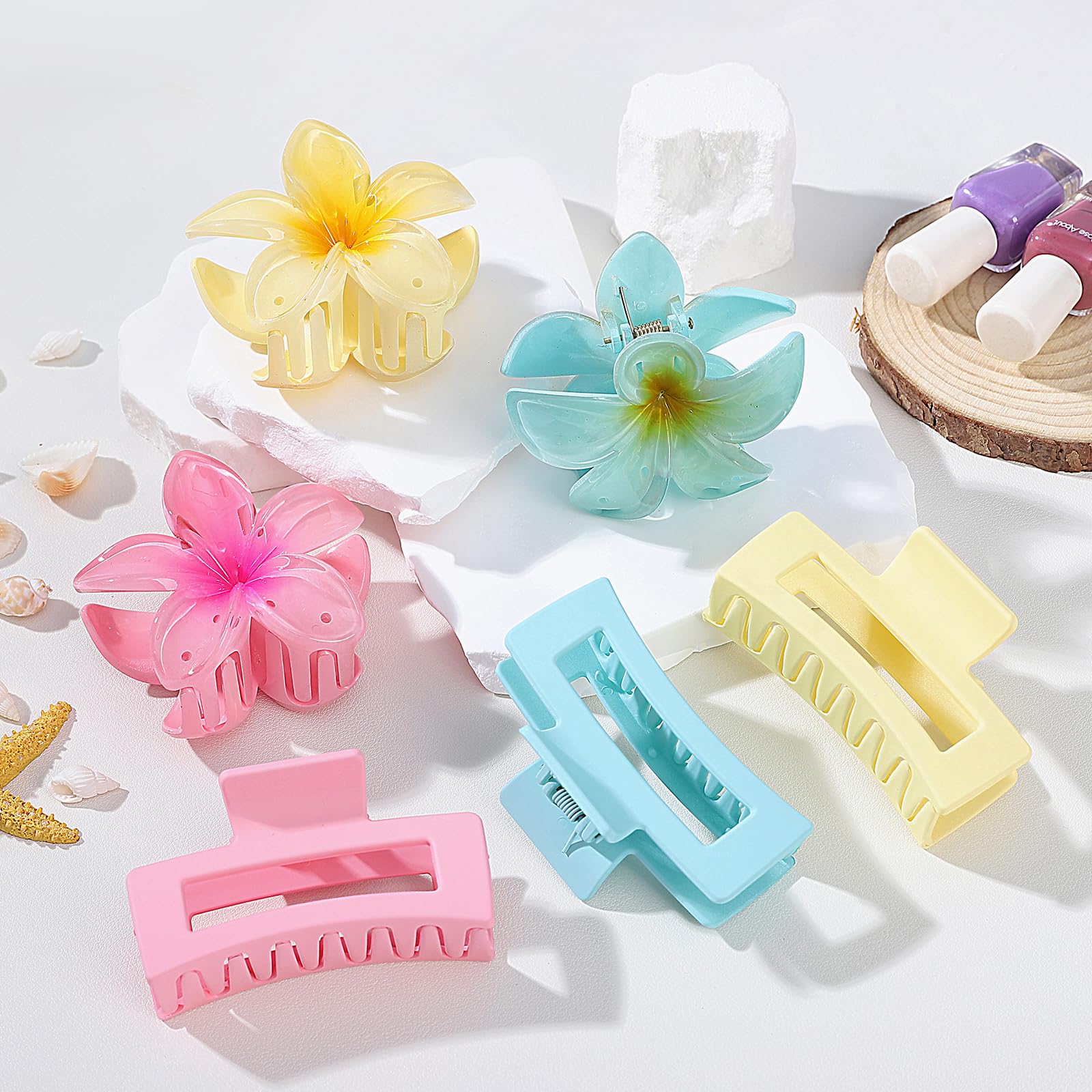 Six piece collection of floral hair styling clips