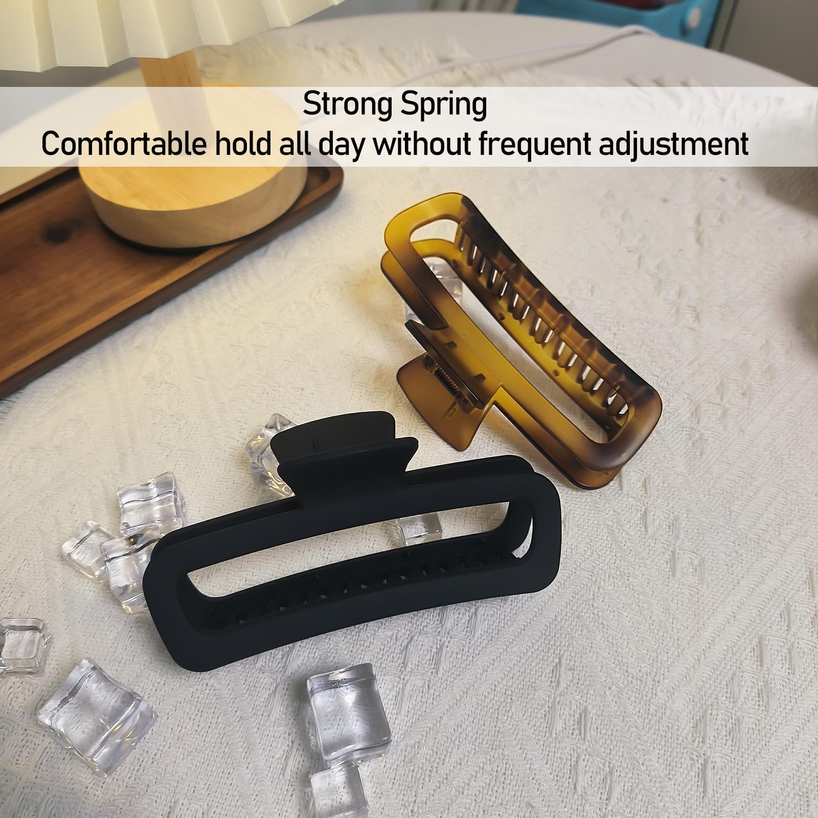 Nalodu hair claw clips held in hand to show 5 inch scale