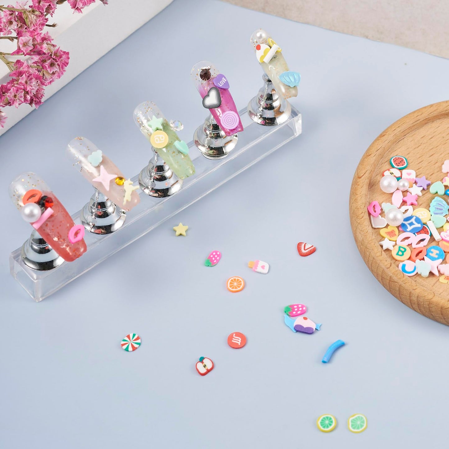 Close up of fruit and heart polymer clay charms
