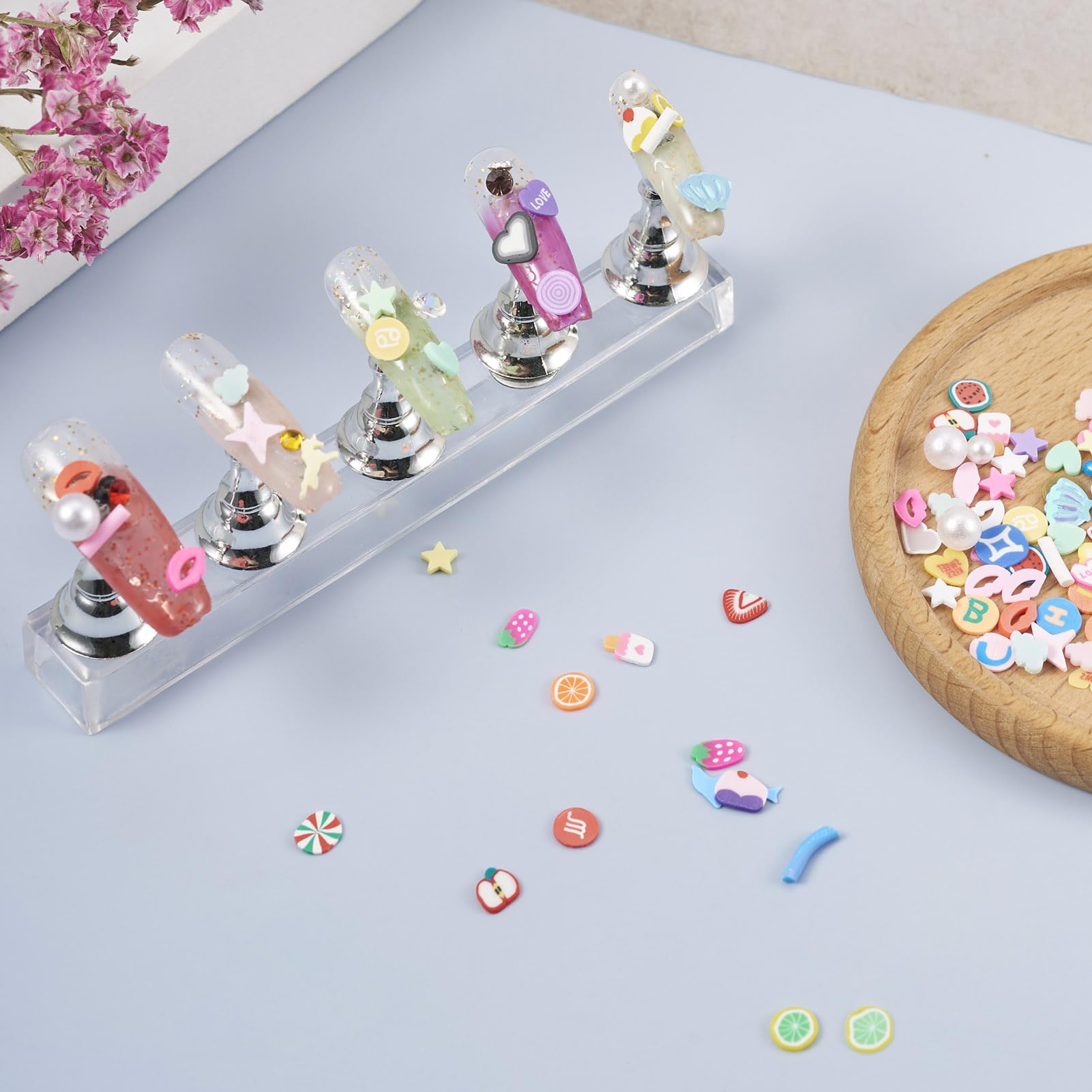 Close up of fruit and heart polymer clay charms