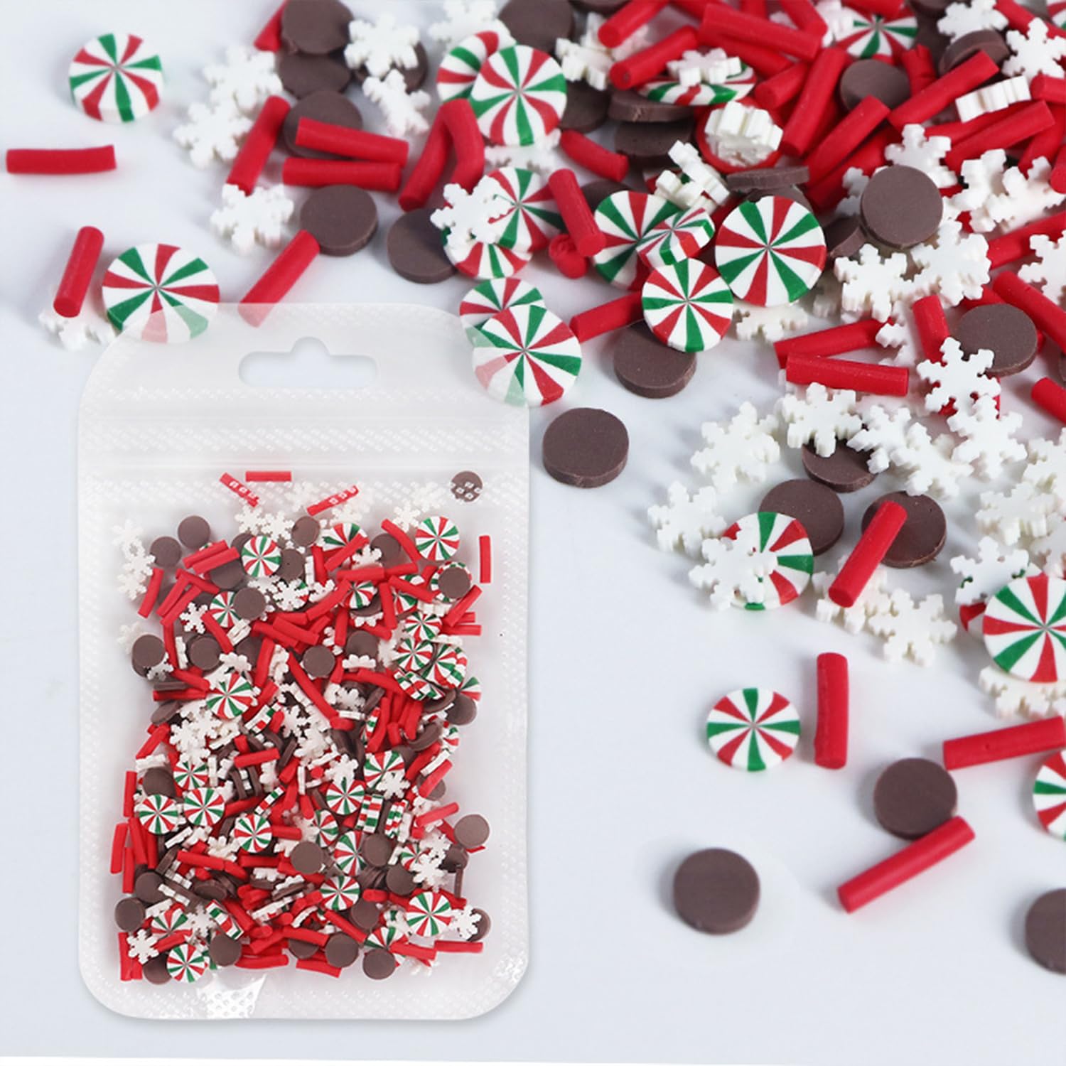 Applying 3D gingerbread man nail slices on acrylic nails
