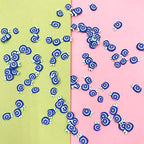 Close up of 5mm blueberry clay slices for nail art