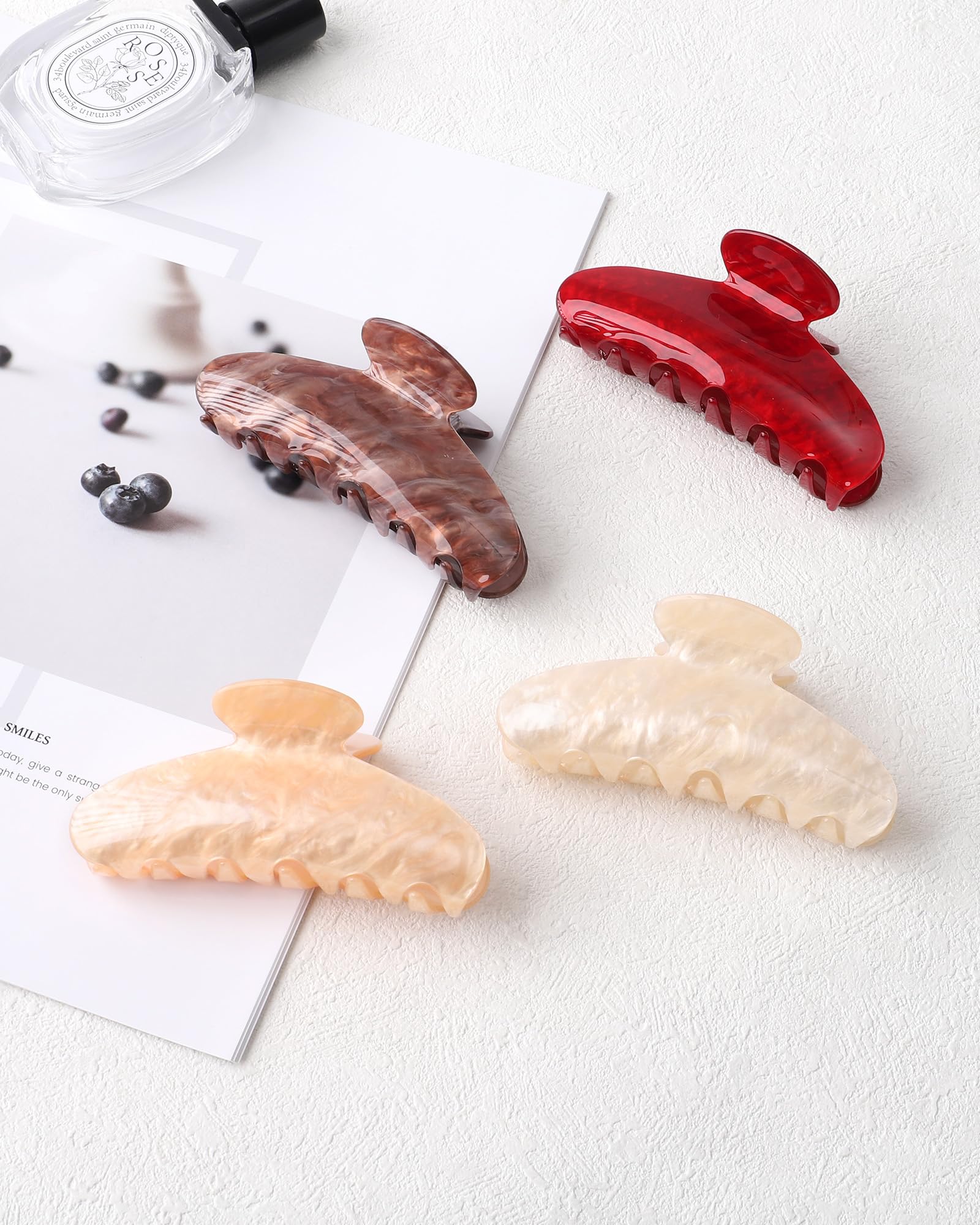 Assorted colors of Sanas large acrylic banana hair clips