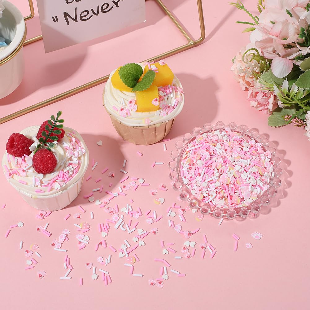 Assorted pink strawberry and flower clay sprinkles for nail design