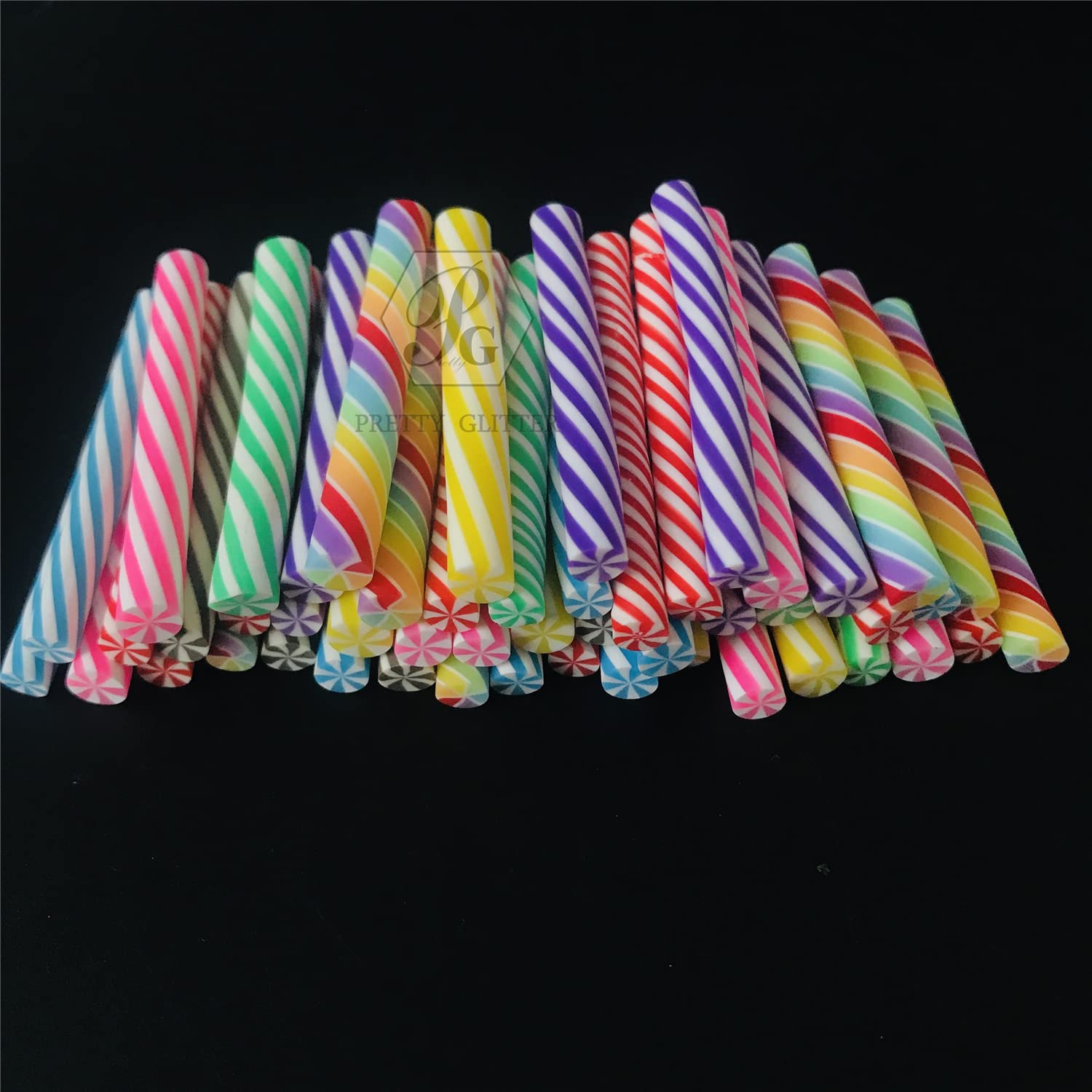 PrettyG soft clay sticks being cut with a craft blade for nail art