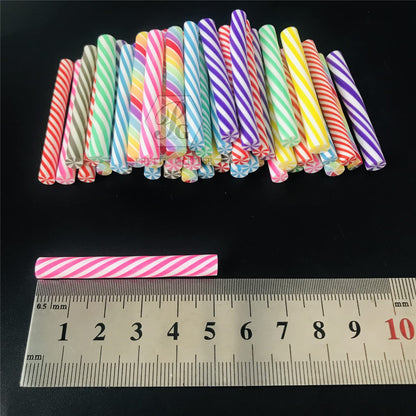 Miniature colorful candy cane slices mixed inside a clear slime kit