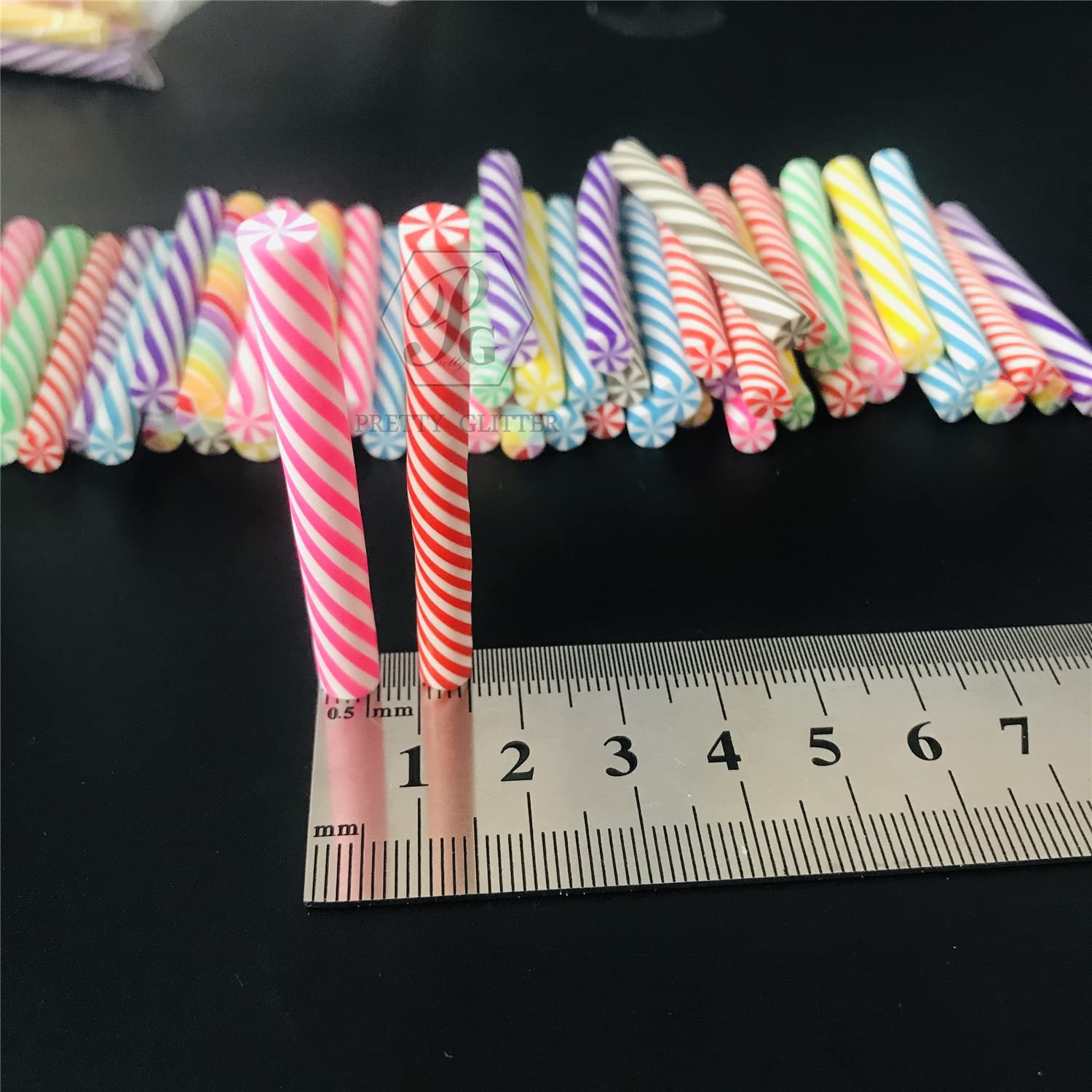 Festive striped polymer clay fimo rods for fake dessert simulation food